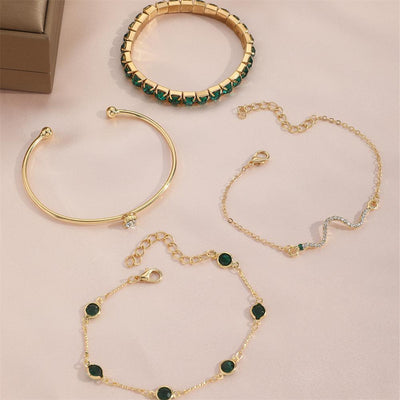 Royal Radiance – 4-Piece Gold Charm Bracelet Set