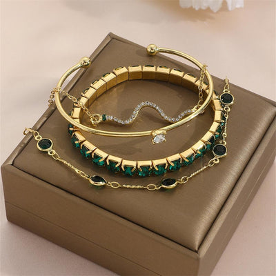 Royal Radiance – 4-Piece Gold Charm Bracelet Set