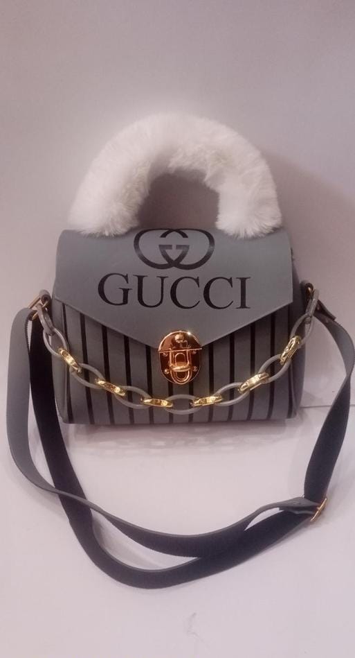 Elegant Gray Handbag with White Faux Fur Handle