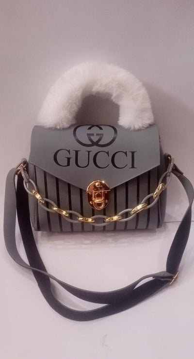 Elegant Gray Handbag with White Faux Fur Handle