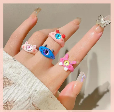Monster Magic: 4pcs Adjustable Multicolor Charm Ring Set