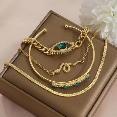 Royal Radiance – 4-Piece Gold Charm Bracelet Set
